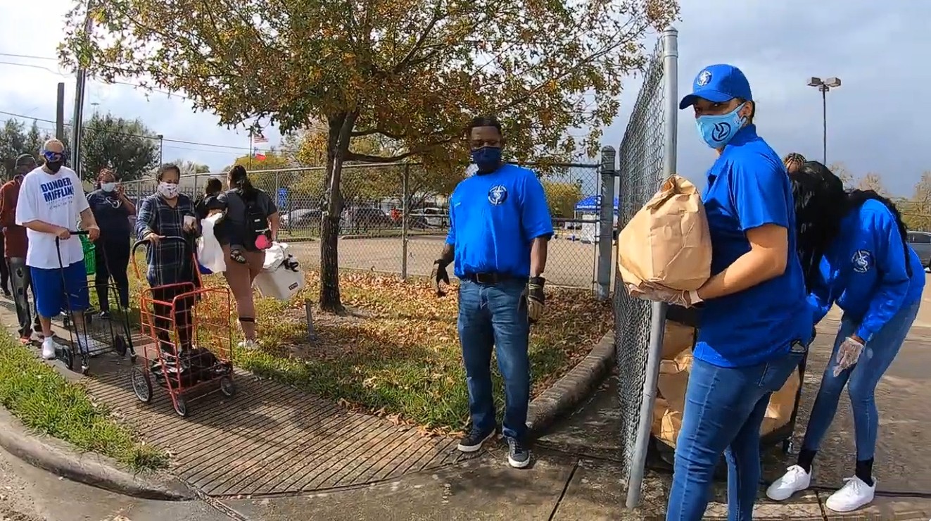 ANGIE GIVING OUT FOOD
